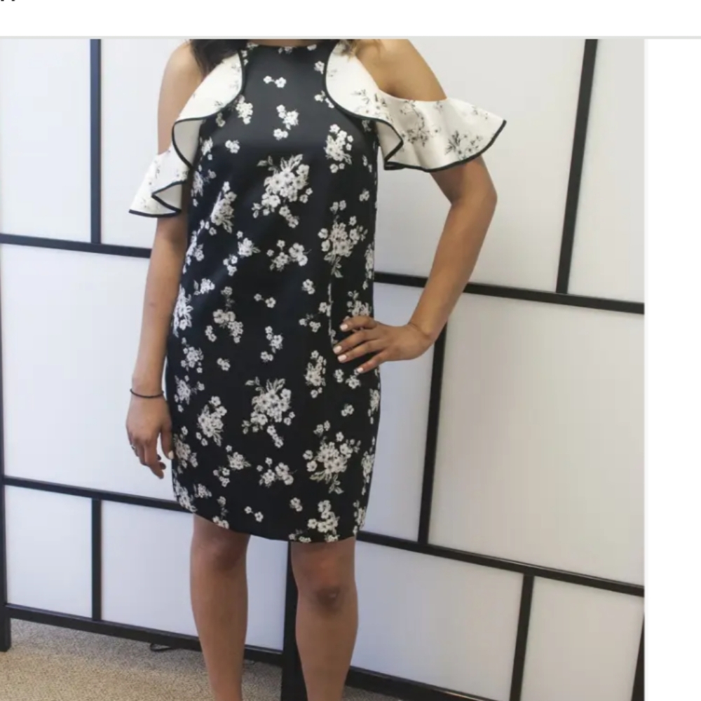 Beautiful black and white cold shoulder dress by Amur.